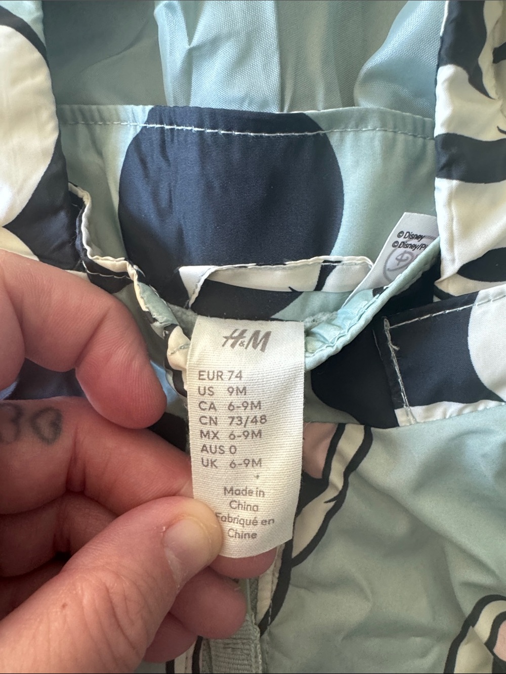 H&M Light Sage Green Mickey Mouse Raincoat with Black and Cream Accents - Picture 2 of 2